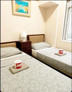 Letto o letti in una camera di The Cultural Crashpad - 康乃馨旅館