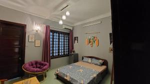 Ένα ή περισσότερα κρεβάτια σε δωμάτιο στο alleyhome Liễu Giai