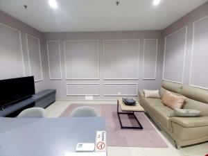 a living room with a couch and a tv at Phenom Homes at i-City - WiFi TV Box 1 Carpark in Shah Alam