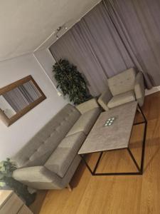 Posezení v ubytování Studio Apartment Central