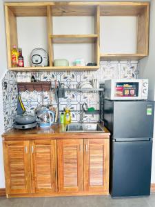 Η κουζίνα ή μικρή κουζίνα στο Maison Honeymoon Sweet l River View l Bathtub l Balcony