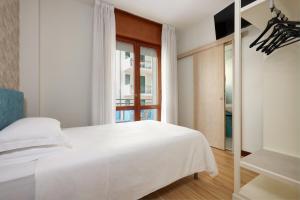 Кровать или кровати в номере Hotel Croce Di Malta