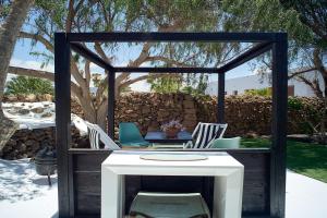 A patio or other outdoor area at UNIQUE Homes Lajares - Only Adults Még 37 kép