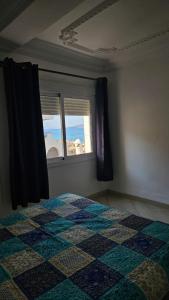 Postel nebo postele na pokoji v ubytování Al amine plage