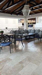 a group of tables and chairs in a building at Zaytoon Residence in Ulcinj +44 photos