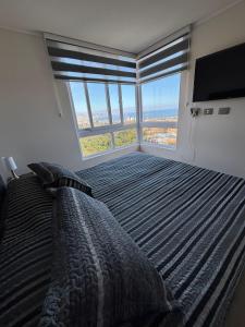 Postel nebo postele na pokoji v ubytování Depto Nuevo - Vista Hermosa Viña del Mar