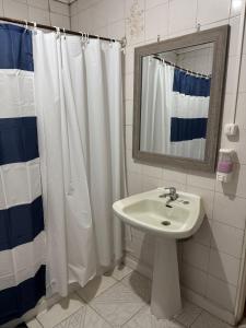 Koupelna v ubytování Casa Magallánica por día para Familia compuesta de 4 personas + 12 fotografií