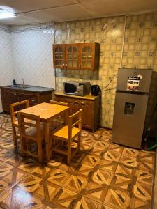 Kuchyň nebo kuchyňský kout v ubytování Casa Magallánica por día para Familia compuesta de 4 personas