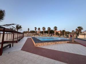 a swimming pool in the middle of a resort at Murdeira V17 RC by RPG Group in Beirona
