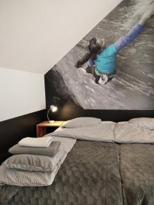 Posteľ alebo postele v izbe v ubytovaní Trafo Base Camp