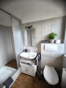 Ένα μπάνιο στο Ferienwohnung Claire