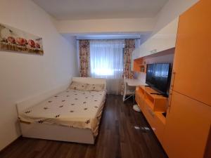 Ένα ή περισσότερα κρεβάτια σε δωμάτιο στο Apartament cu 3 camere in Militari Residence