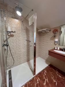 a bathroom with a shower and a sink at Doade in Hio