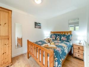 Ένα ή περισσότερα κρεβάτια σε δωμάτιο στο The Lodge +9 φωτογραφίες