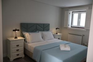 Ένα ή περισσότερα κρεβάτια σε δωμάτιο στο Casa d'Artengo