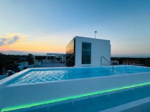 a swimming pool on the roof of a house at Schiavon Beach Palace in Lido di Jesolo
