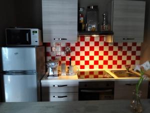 Kuchyň nebo kuchyňský kout v ubytování Il Borgo del Castello