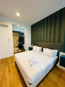 Giường trong phòng chung tại Platinum Suites Klcc by Luxe Residence +22 ảnh