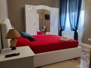 Postel nebo postele na pokoji v ubytování Il Borgo del Castello