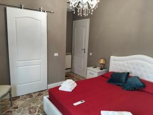 Postel nebo postele na pokoji v ubytování Il Borgo del Castello