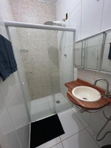 Baðherbergi á Suite dos anjos