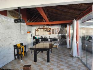 Posezení v ubytování Casa com piscina matinhos