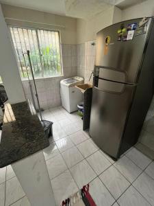 Dapur atau dapur kecil di Quarto Privativo em Condomínio próx ao Cohatrac