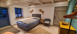 Ένα ή περισσότερα κρεβάτια σε δωμάτιο στο Ferienhaus Watt'n Glück