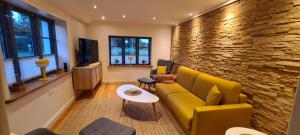 Μια τηλεόραση ή/και κέντρο ψυχαγωγίας στο Ferienhaus Watt'n Glück