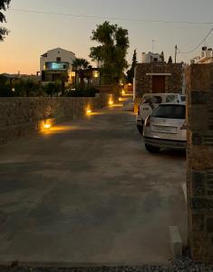 a parking lot at night with cars parked at Agios Nikolaos Open Living Suite in Agios Nikolaos