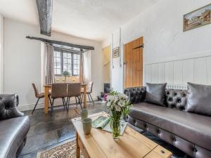 Et opholdsområde på Faith Cottage