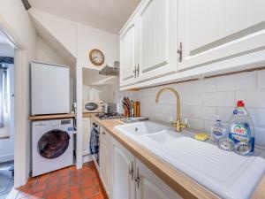 Køkken eller tekøkken på Faith Cottage