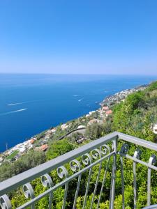 a view of the ocean from a balcony at Casa Belle Vue in Furore