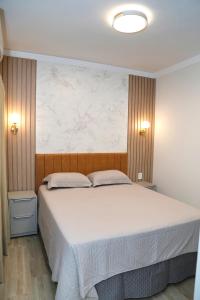 Katil atau katil-katil dalam bilik di Comforto e tranquilidade +23 gambar