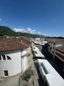 an aerial view of a town with buildings at Modern & Cosy Flat in Maniago! in Maniago