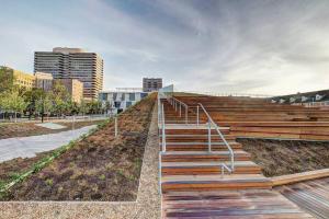 a set of stairs in a city with buildings at Tranquil Escape- Spa Bath & Pool for One or Couples in Houston