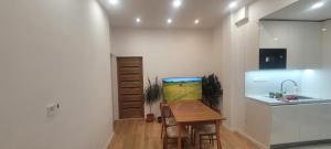 Кухня или мини-кухня в Relax Apartment
 +18 фотографий
