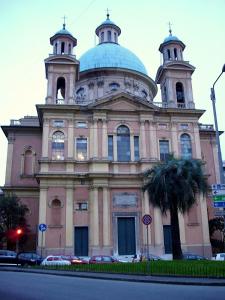 a large building with a dome on top of it at Casa Alimonda in Genoa