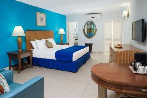 Rúm í herbergi á Deja Resort All Inclusive