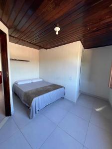 Postel nebo postele na pokoji v ubytování Casa de Zenaide