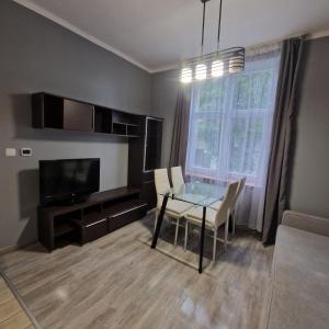 TV a/nebo společenská místnost v ubytování Apartament Anna