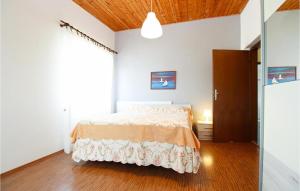 Ένα ή περισσότερα κρεβάτια σε δωμάτιο στο Gorgeous Apartment In Premantura +6 φωτογραφίες