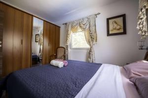 Voodi või voodid majutusasutuse Holiday house with a swimming pool Pridraga - Cuskijas, Novigrad - 24776 toas +12 fotot