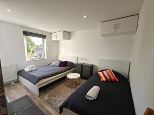 En eller flere senge i et værelse på Southern Sun