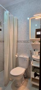 a bathroom with a toilet and a sink at Dar Tetuan 4 You III in Tétouan +16 photos