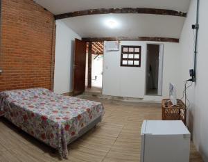 Postel nebo postele na pokoji v ubytování Flat Trindade