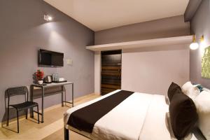 Televisyen dan/atau pusat hiburan di Hotel O Neatflix &Chill