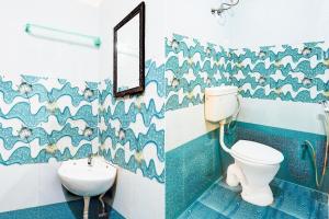 Koupelna v ubytování Super Collection O Thousand Lights Chennai