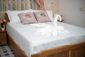 Ένα ή περισσότερα κρεβάτια σε δωμάτιο στο Abbey Lodge 2 +10 φωτογραφίες
