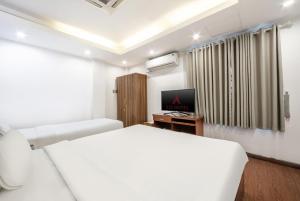 Μια τηλεόραση ή/και κέντρο ψυχαγωγίας στο A25 Hotel - 28 Trần Quý Cáp